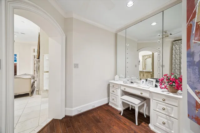a living room with balcony stairs and furniture