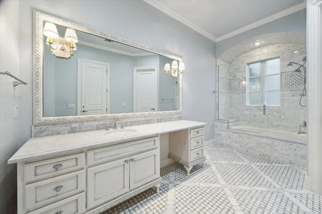 a bedroom with two beds and painting on the wall