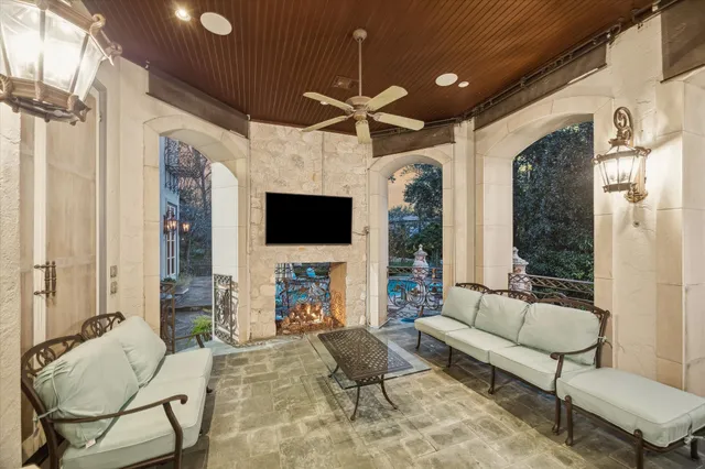 a front view of a house with outdoor seating