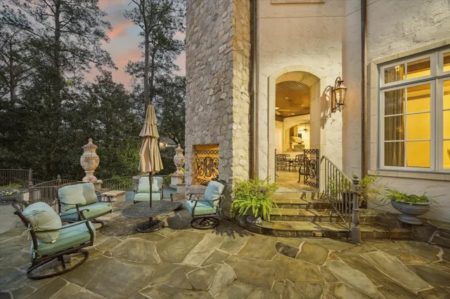 a view of swimming pool with seating space