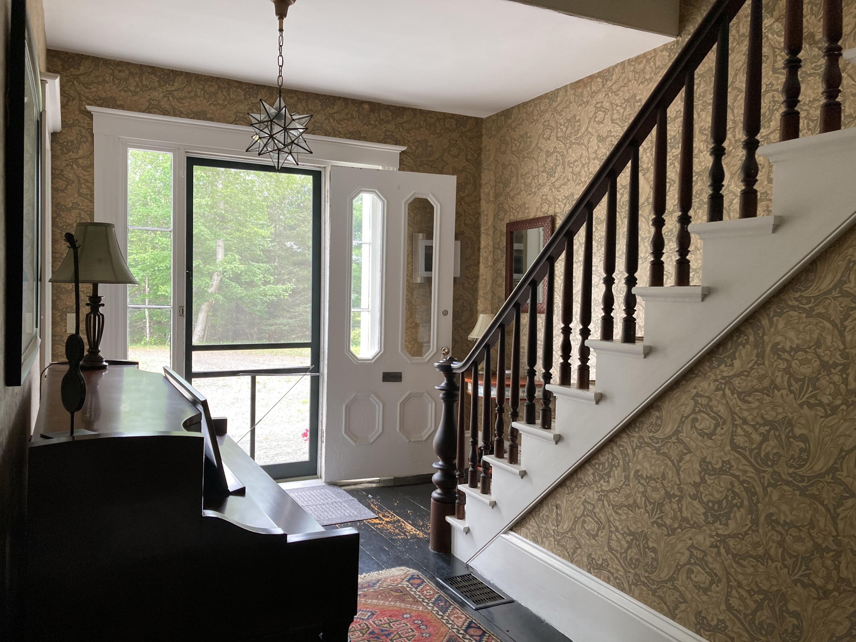 384 Point Road Hancock, ME 04640 - Photo 22 of 70 Staircase to 2nd floor from entry.