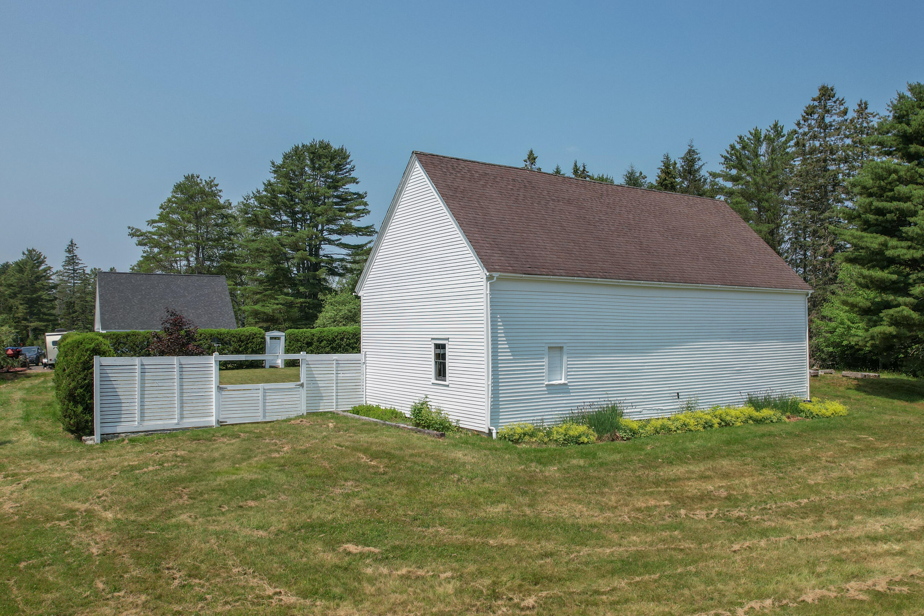 384 Point Road Hancock, ME 04640 - Photo 54 of 70 Rear of barn and fence & gate to yard.