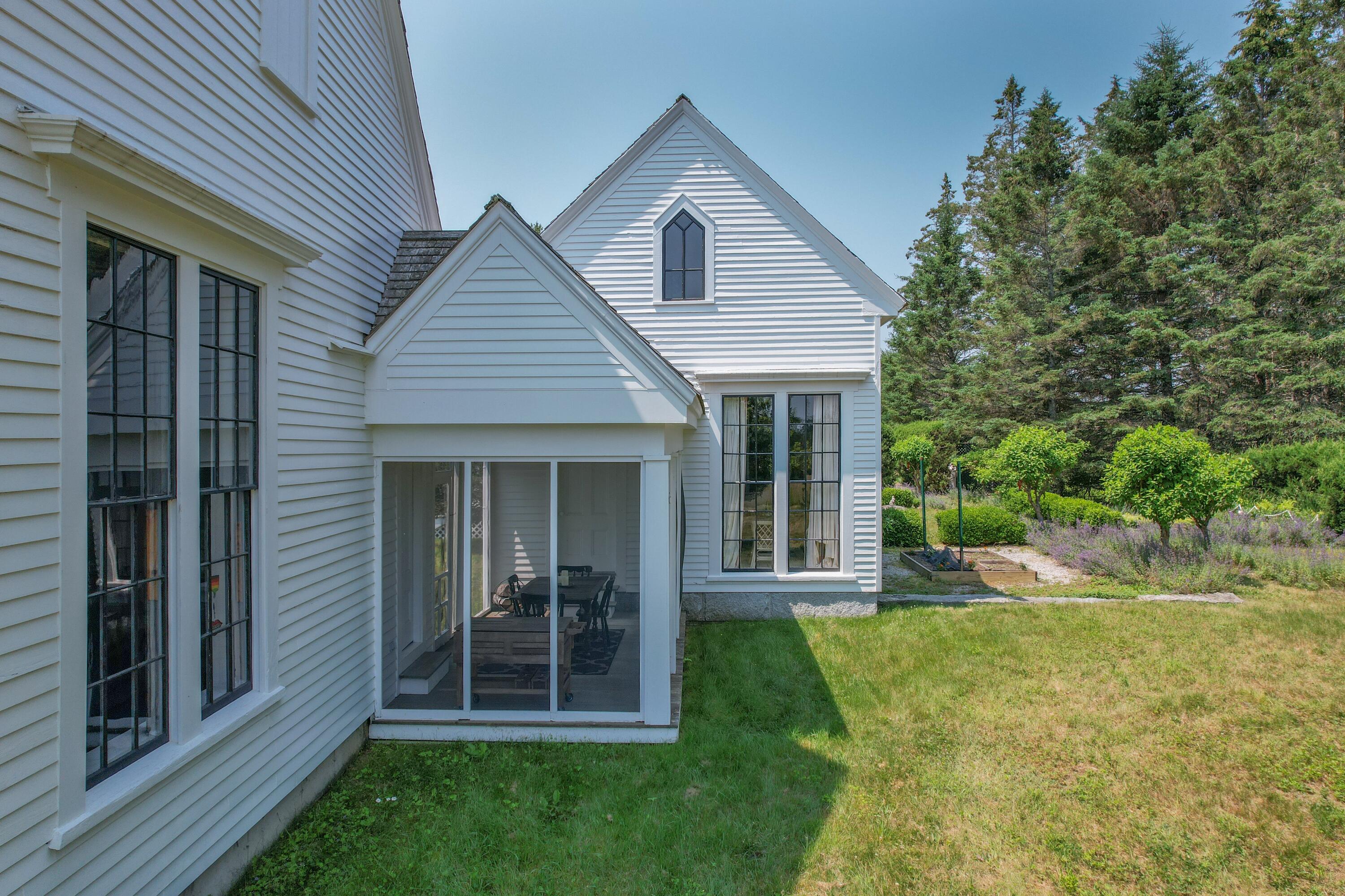384 Point Road Hancock, ME 04640 - Photo 57 of 70 Studio windows, porch, great room.