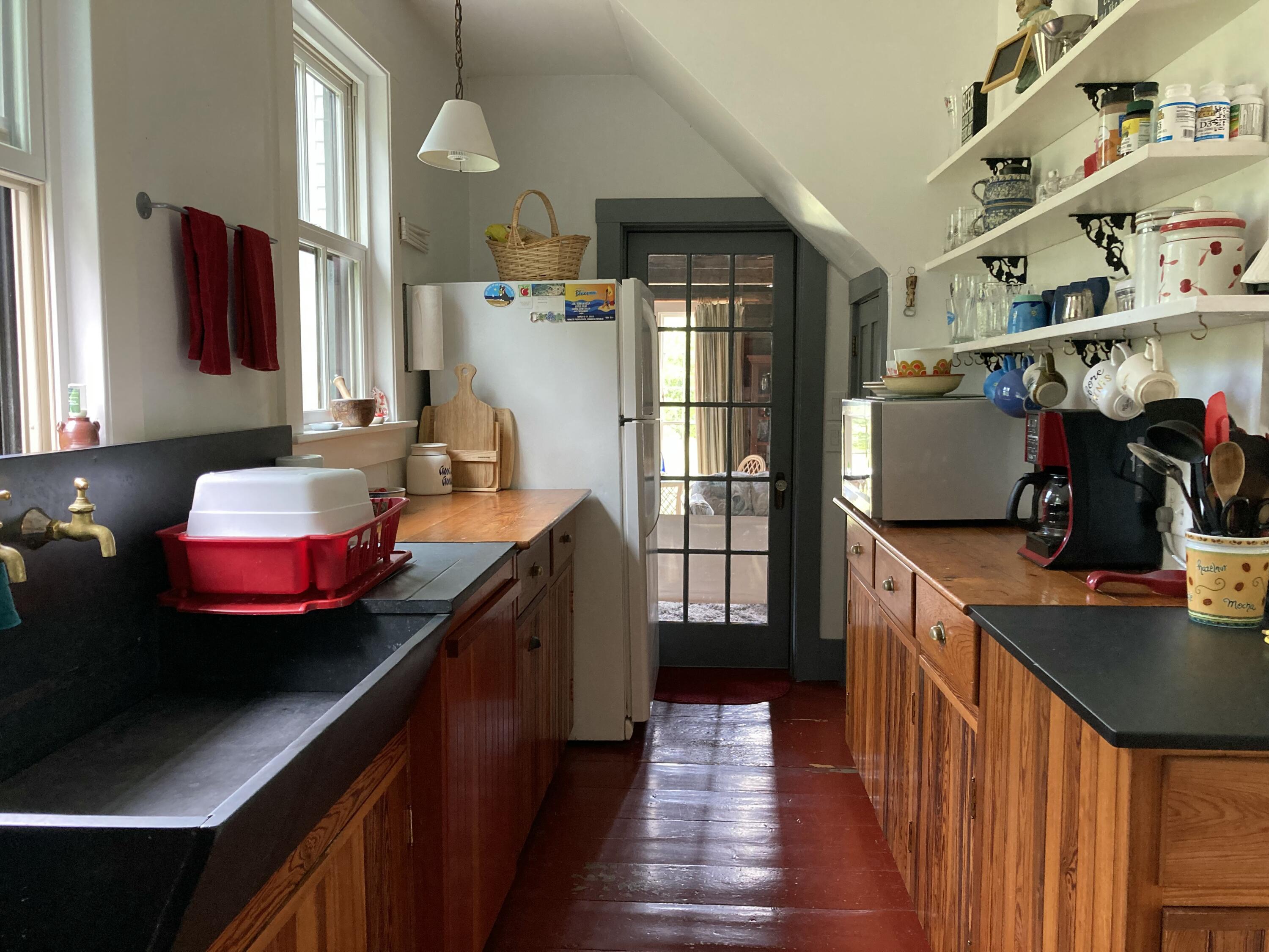 384 Point Road Hancock, ME 04640 - Photo 10 of 70 Slate sink & door to great room.