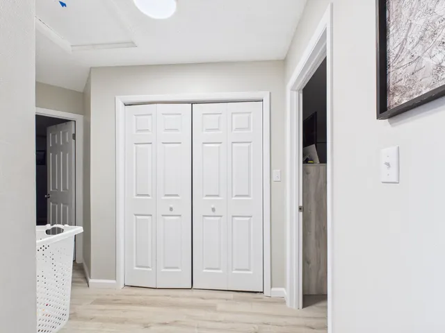 a view of a livingroom with wooden floor