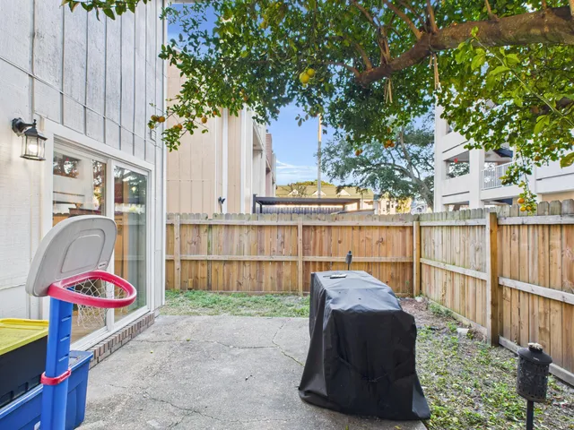 a view of a balcony with a tree