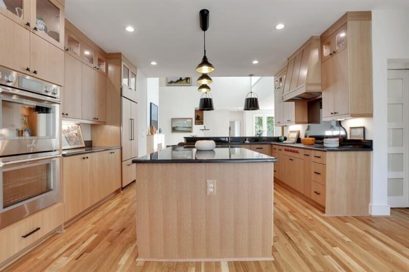 1211 Oakdale Road Northeast Atlanta, GA 30307 - Photo 13 of 67 a large kitchen with granite countertop a large counter top a sink stainless steel appliances and cabinets