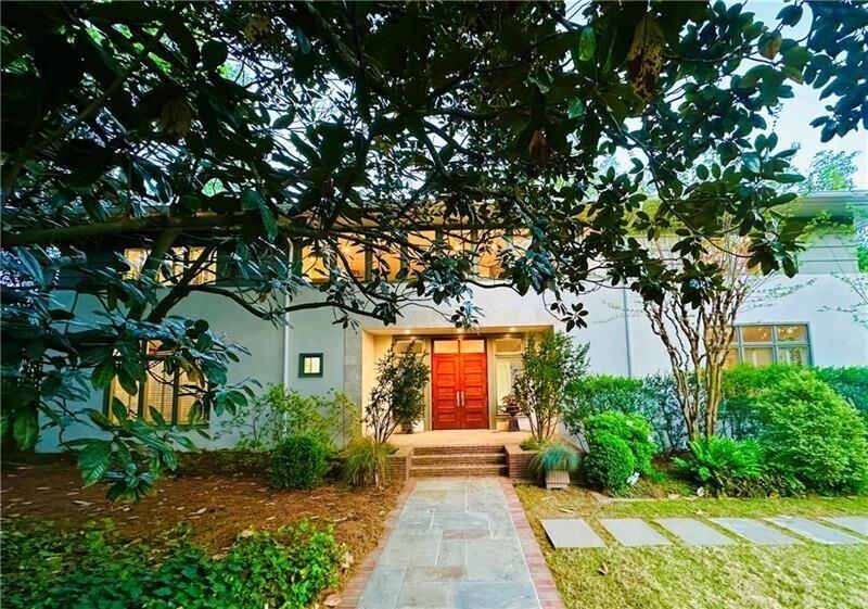 1211 Oakdale Road Northeast Atlanta, GA 30307 - Photo 2 of 67 a front view of a house with garden