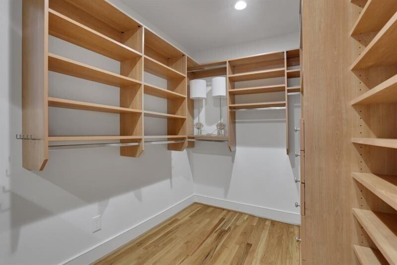 1211 Oakdale Road Northeast Atlanta, GA 30307 - Photo 26 of 67 a view of walk in closet with empty racks