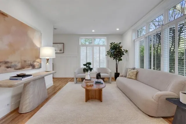 a kitchen with stainless steel appliances kitchen island granite countertop a sink and cabinets
