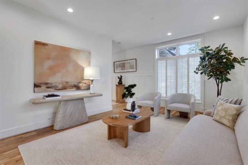1211 Oakdale Road Northeast Atlanta, GA 30307 - Photo 8 of 67 a living room with furniture and a large window