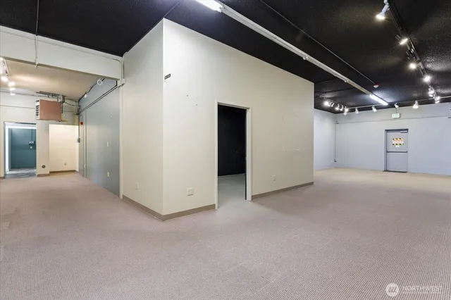 a view of room that has a bed