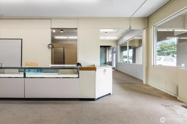 a view of hallway with a large window