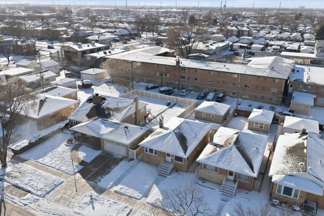 an aerial view of a city with lots of residential buildings