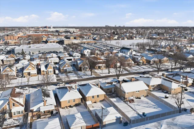 an aerial view of a city with lots of residential buildings