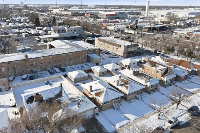 an aerial view of a city with lots of residential buildings