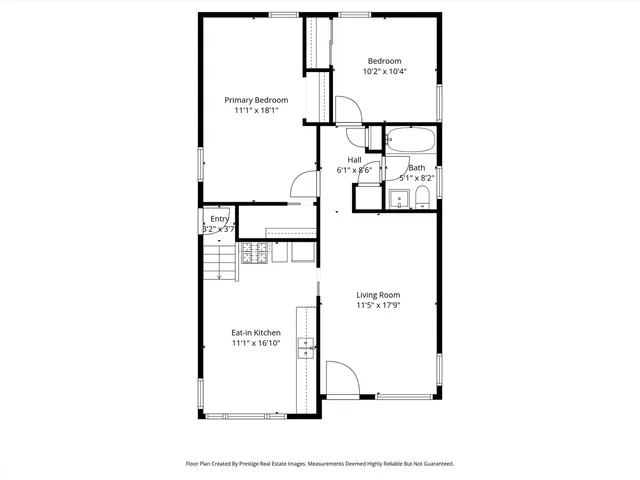 a picture of a bench in front of a wall