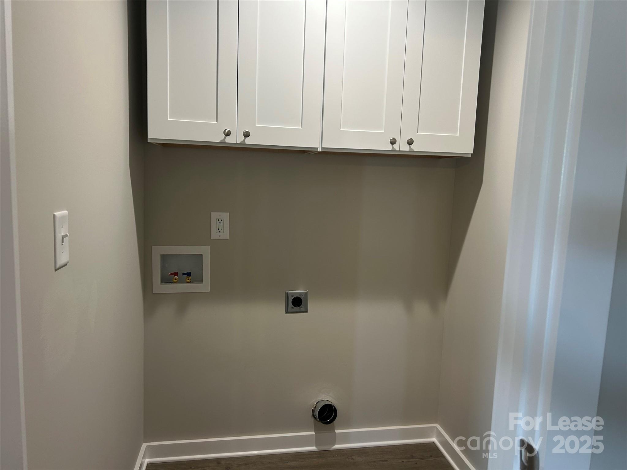 3299 Paul Elmore Road Lincolnton, NC 28092 - Photo 12 of 14 a view of cabinets and dryer