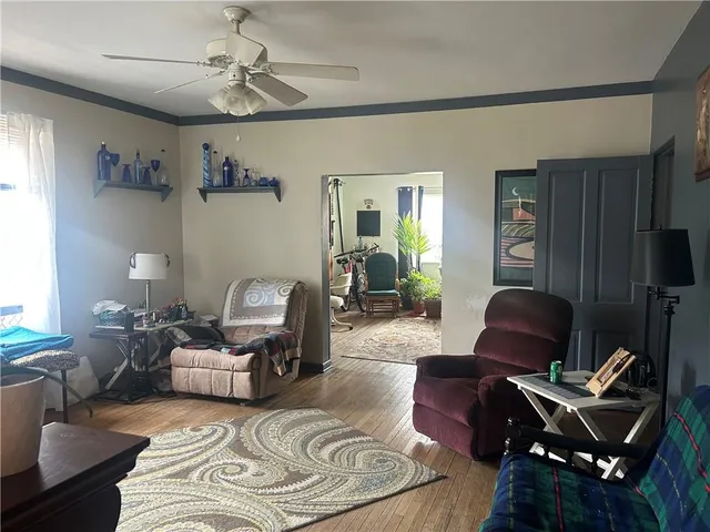 a kitchen with a sink stove and microwave