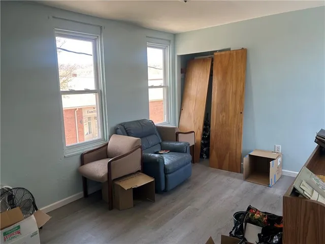 a room with furniture and window