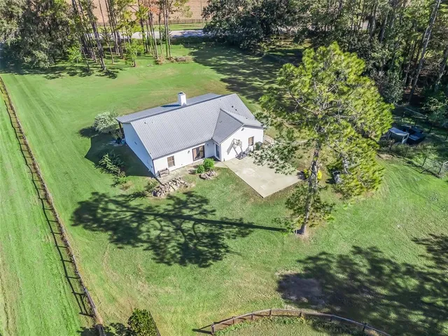 a view of a golf course with a lake