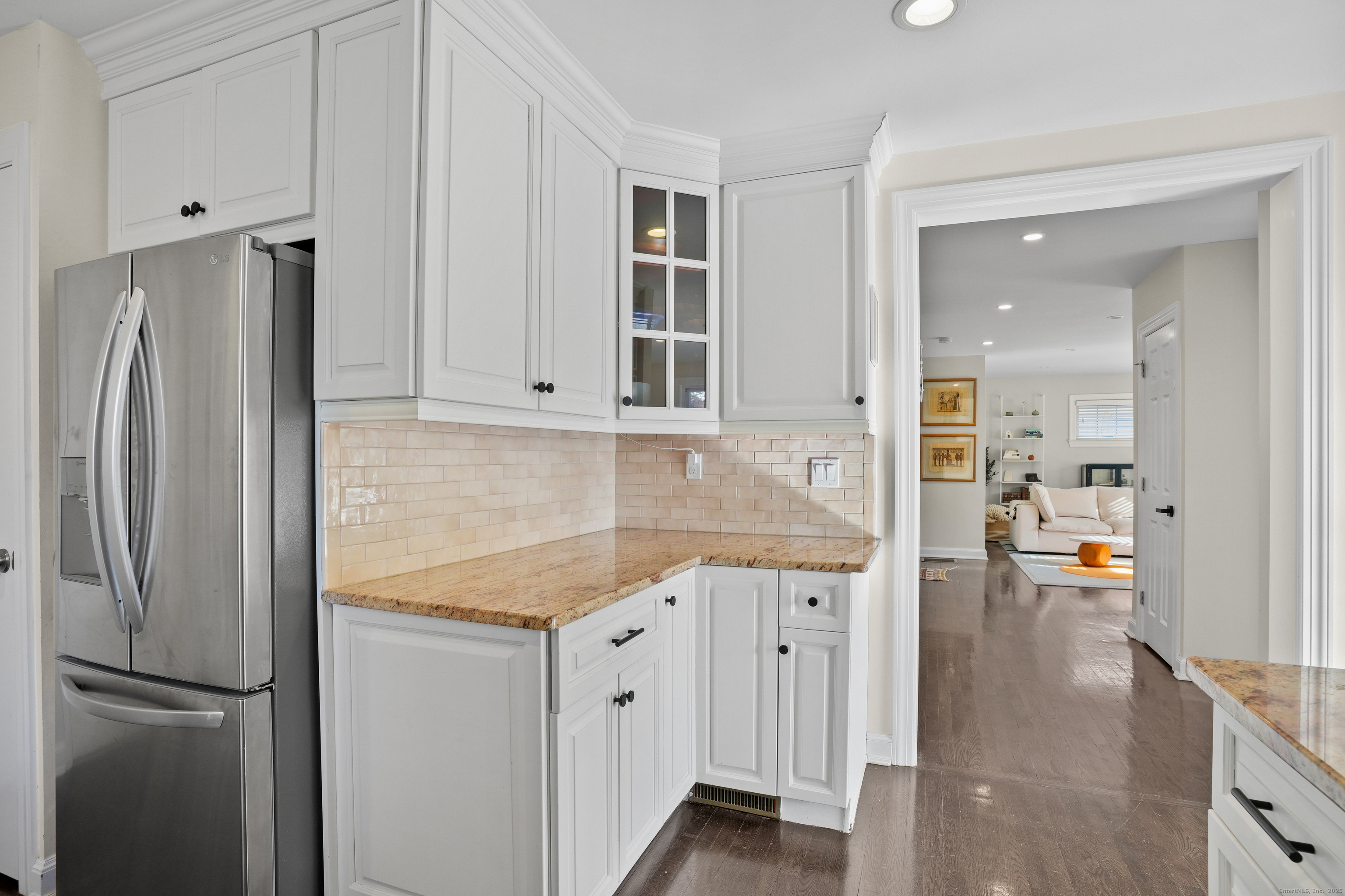 100 Hirsch Road Stamford, CT 06905 - Photo 11 of 39 a kitchen with stainless steel appliances granite countertop a refrigerator and a stove