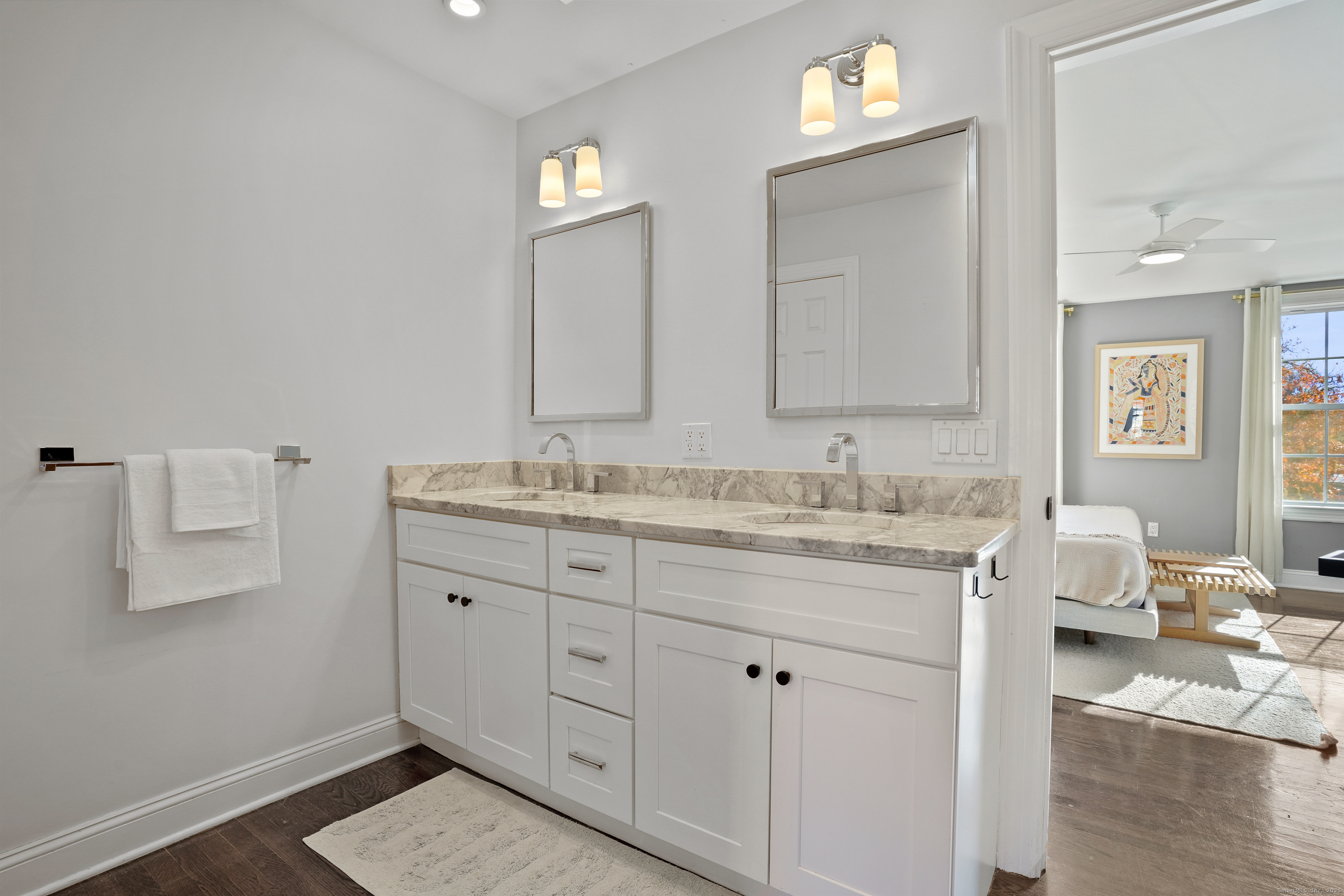 100 Hirsch Road Stamford, CT 06905 - Photo 20 of 39 a bathroom with a granite countertop sink and a mirror