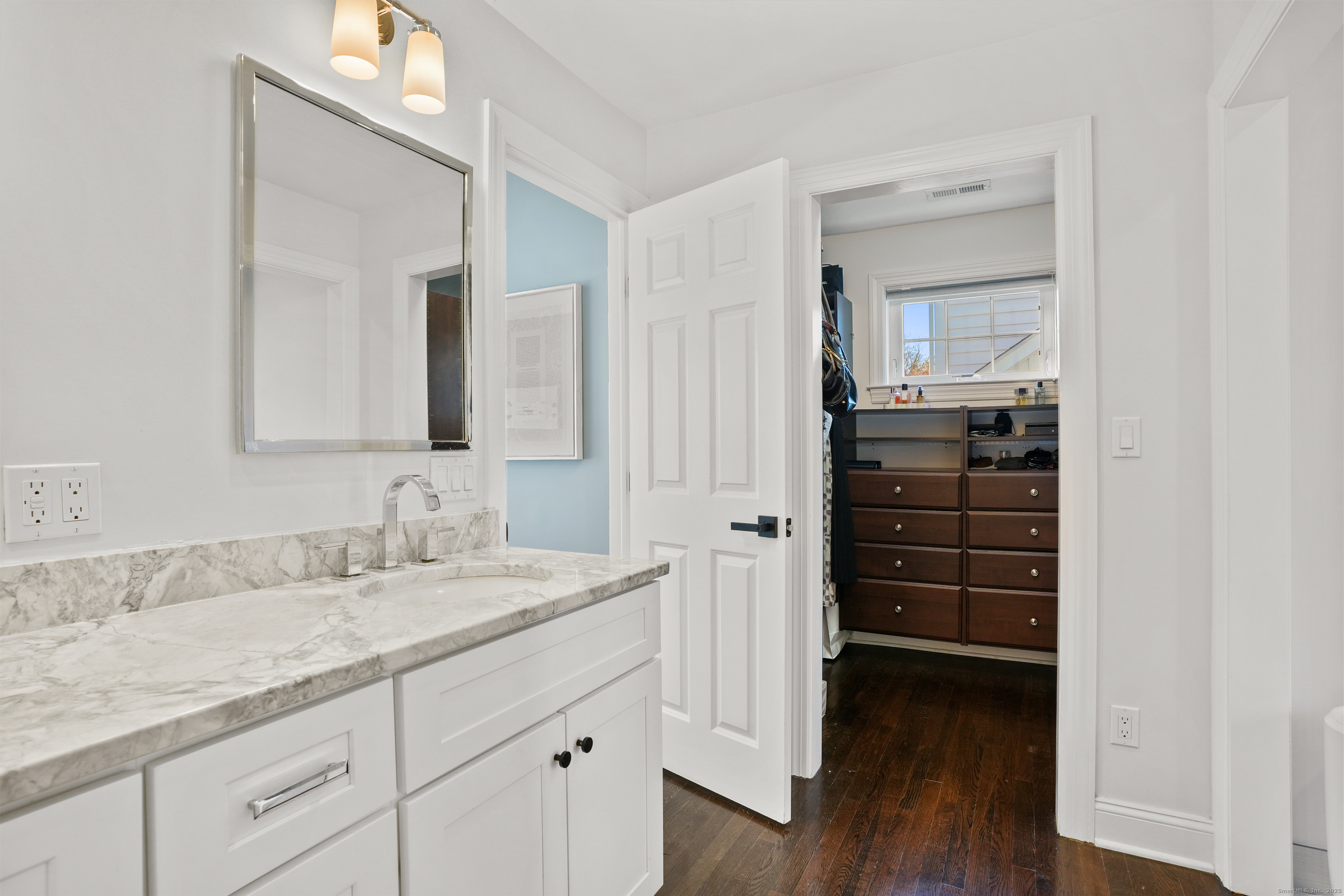 100 Hirsch Road Stamford, CT 06905 - Photo 21 of 39 a bathroom with a granite countertop sink and a mirror