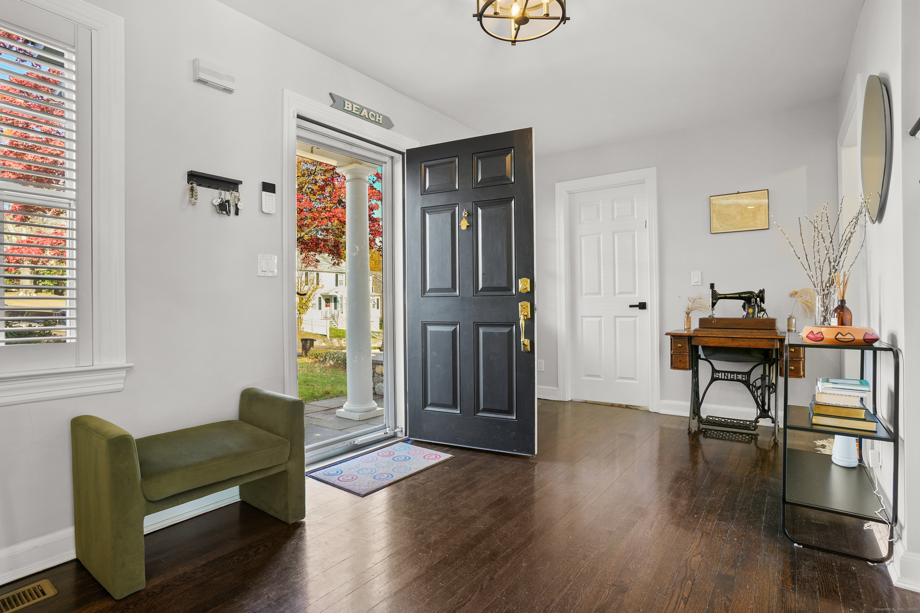 100 Hirsch Road Stamford, CT 06905 - Photo 3 of 39 a living room with furniture and a window