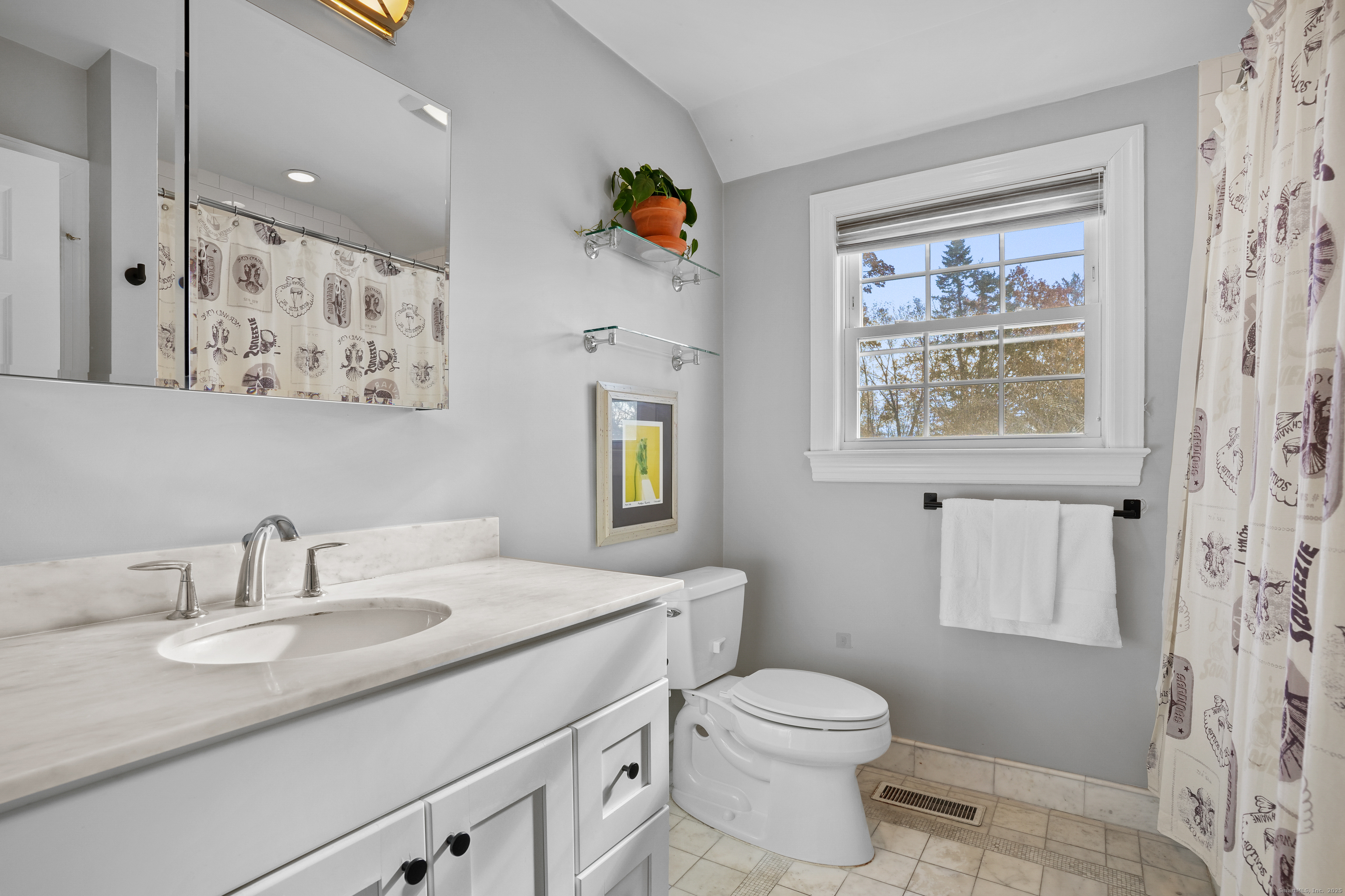 100 Hirsch Road Stamford, CT 06905 - Photo 32 of 39 a bathroom with a toilet a sink and a window