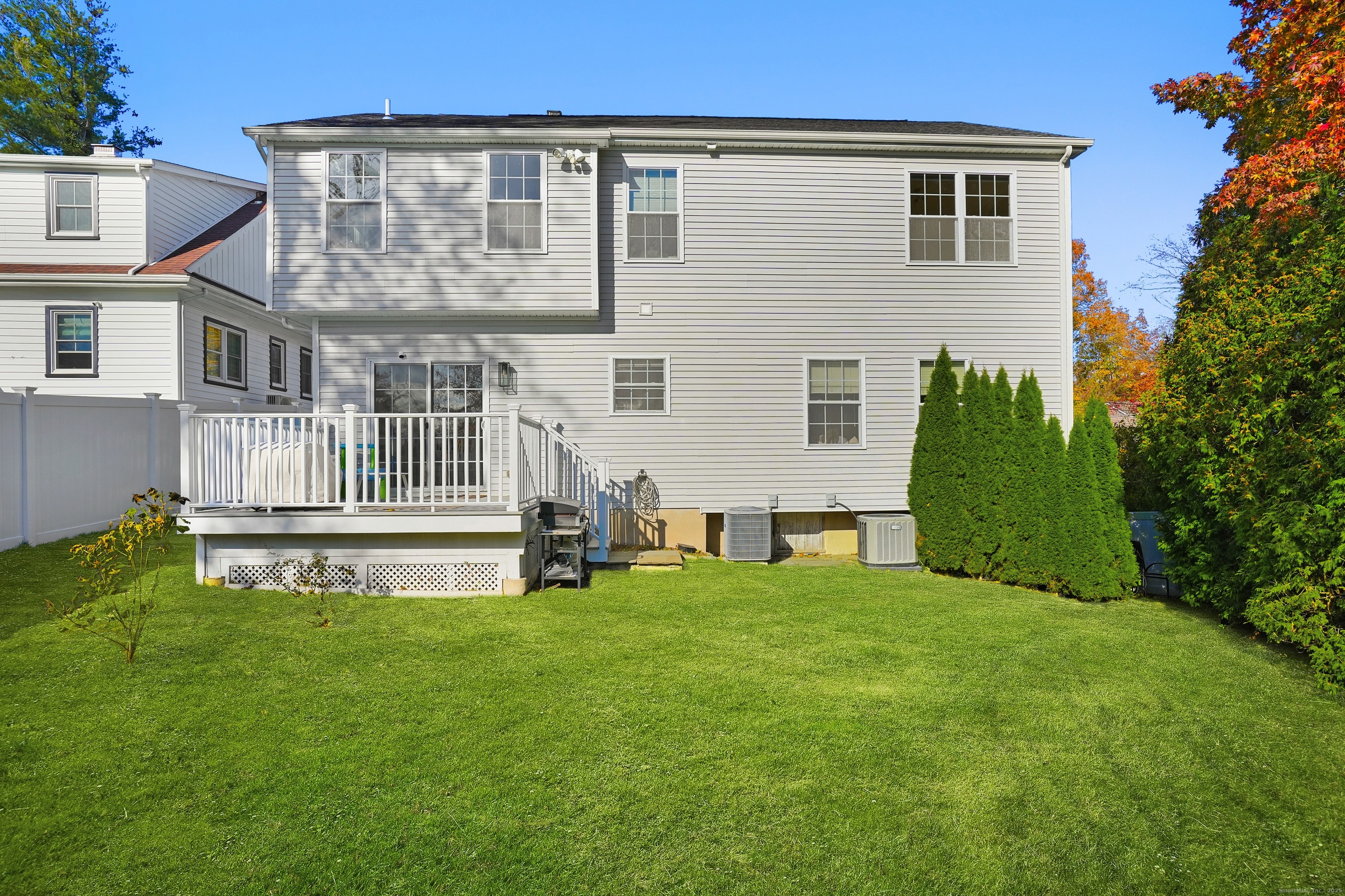 100 Hirsch Road Stamford, CT 06905 - Photo 36 of 39 a view of a house with a yard and sitting area