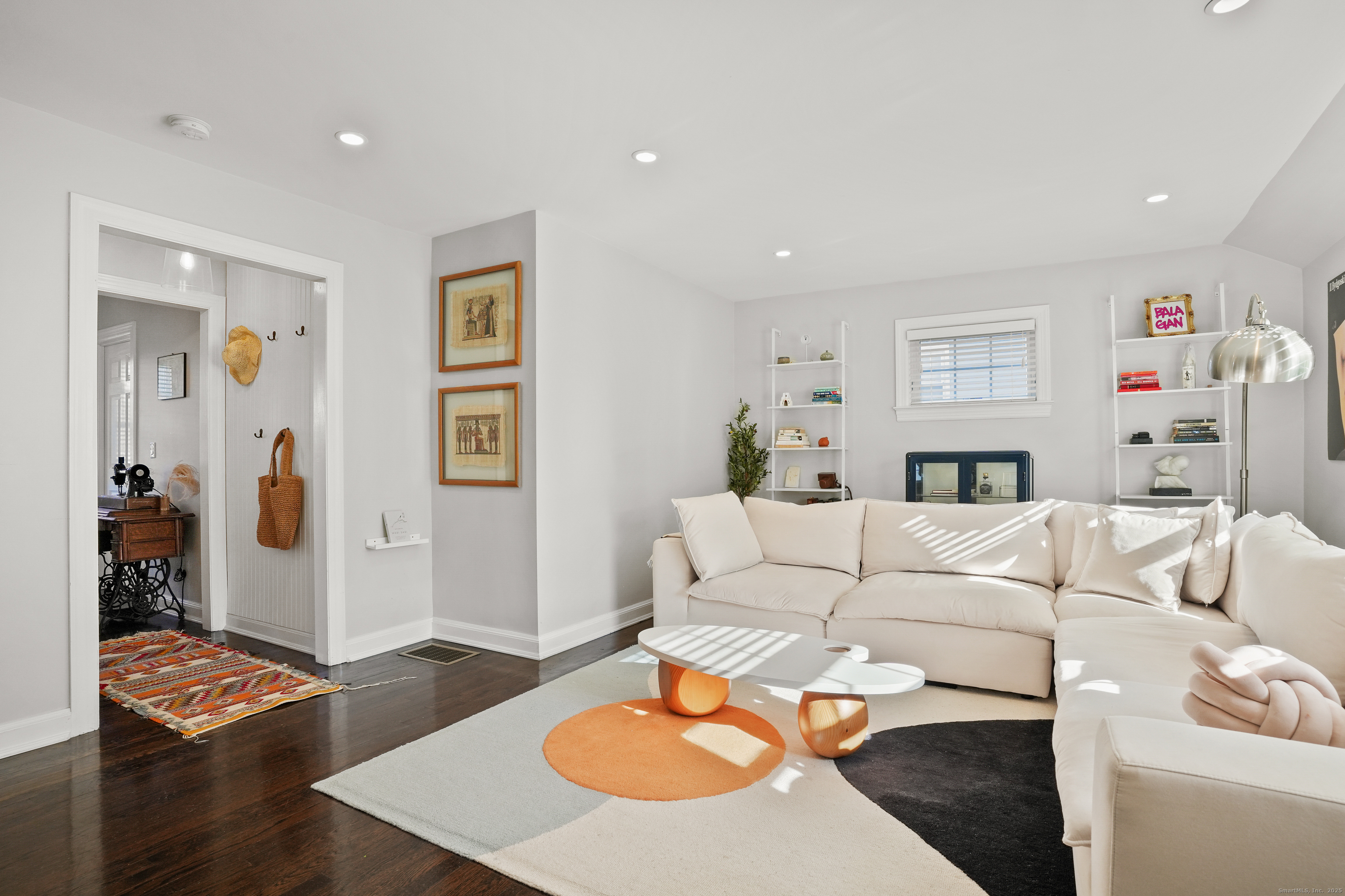 100 Hirsch Road Stamford, CT 06905 - Photo 6 of 39 a living room with furniture and wooden floor