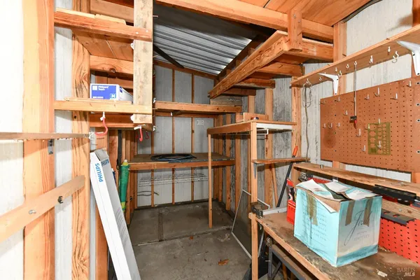 a view of swimming pool with outdoor seating