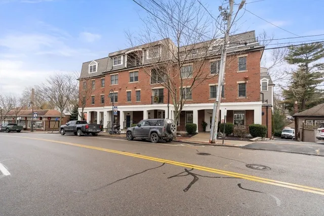 a view of a street with cars