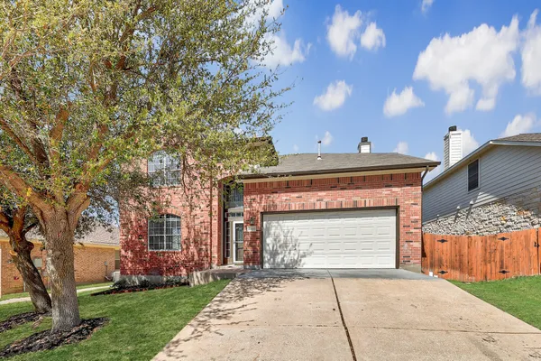 a view of a building and a yard