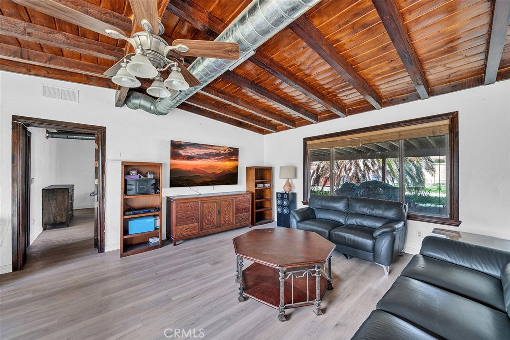 31516 Clay River Road Barstow, CA 92311 - Photo 14 of 73 a living room with furniture and a flat screen tv