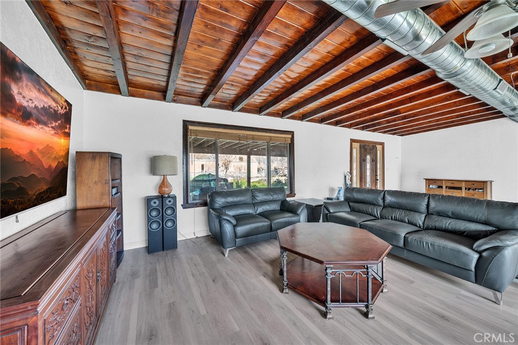 31516 Clay River Road Barstow, CA 92311 - Photo 16 of 73 a living room with furniture and a flat screen tv