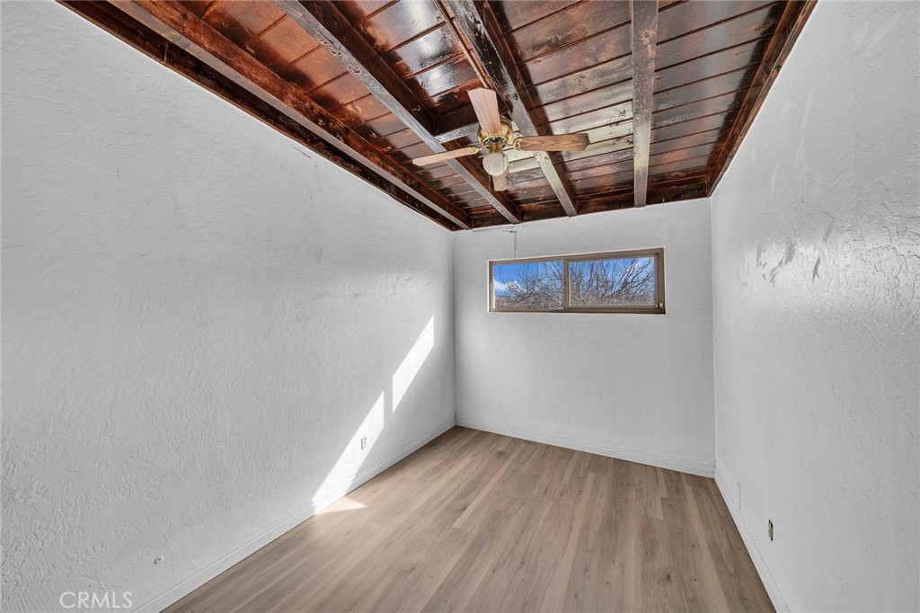 31516 Clay River Road Barstow, CA 92311 - Photo 33 of 73 a view of hallway with wooden floor