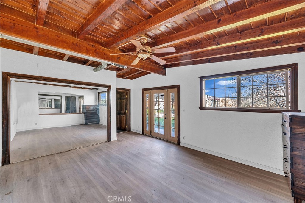 31516 Clay River Road Barstow, CA 92311 - Photo 46 of 73 a view interior of a house with wooden floor and windows