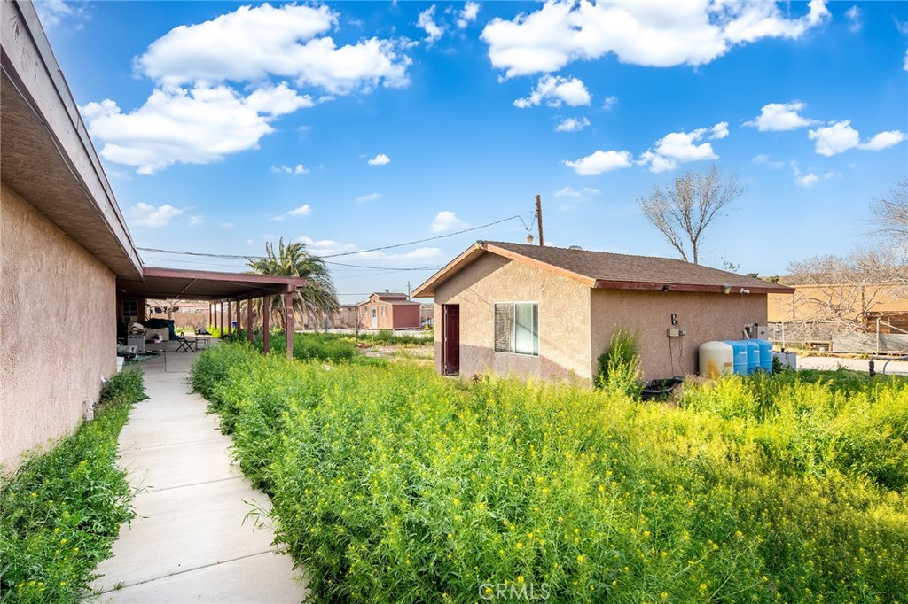 31516 Clay River Road Barstow, CA 92311 - Photo 8 of 73 a house view with a yard