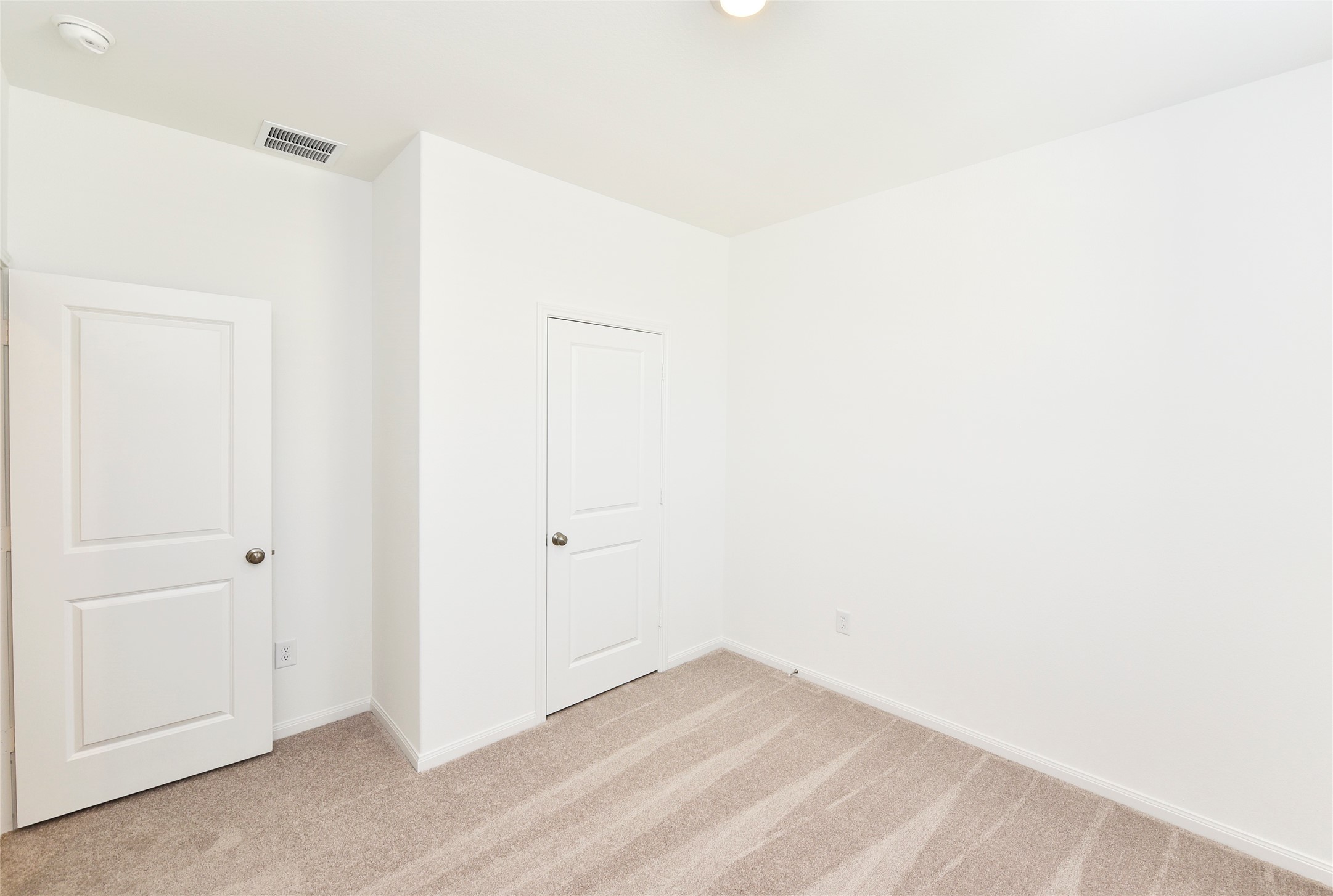 25473 Cilantro Drive Magnolia, TX 77355 - Photo 10 of 21 Just off the entry is a secondary bedroom. This space would also make a great office or playroom.