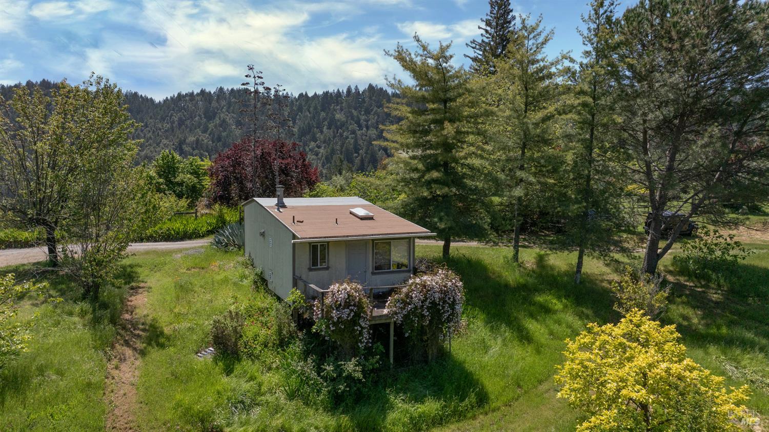 10957 Westside Road Healdsburg, CA 95448 - Photo 25 of 30 a front view of a house with garden