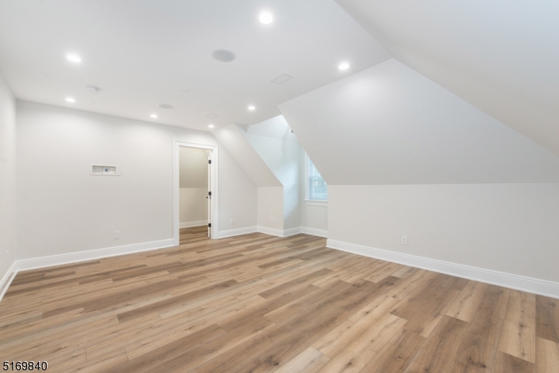 31-37 Oak Grove Road, Unit 2 Caldwell, NJ 07006 - Photo 27 of 34 a view of an empty room with wooden floor