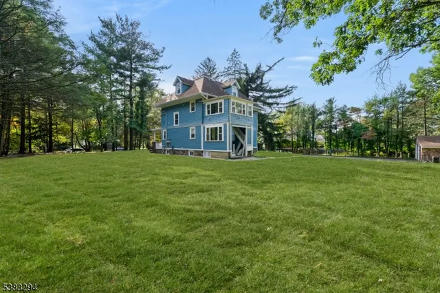a view of a house with a big yard