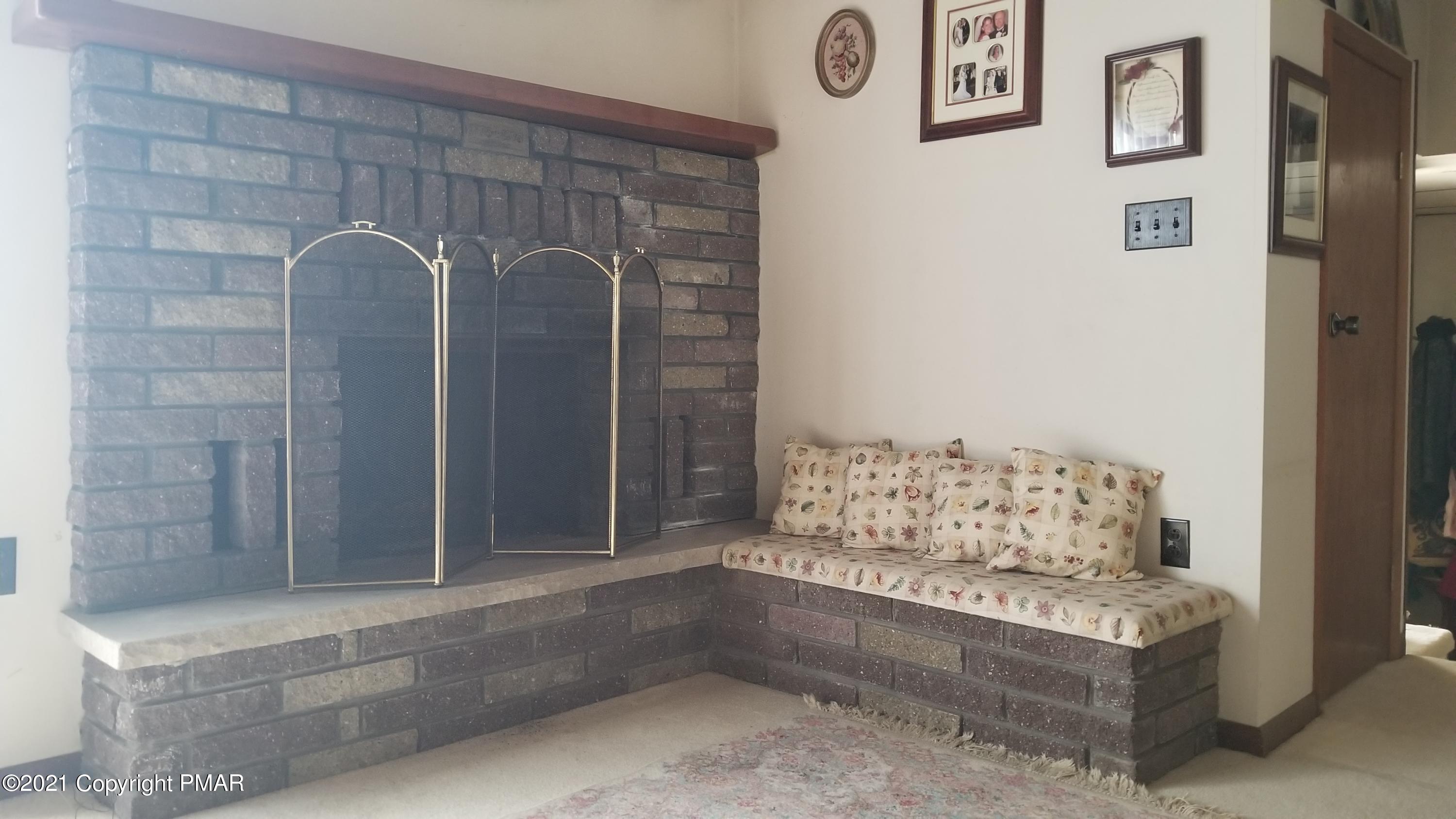 313 Orchard Road Swiftwater, PA 18370 - Photo 18 of 40 Brick Fireplace