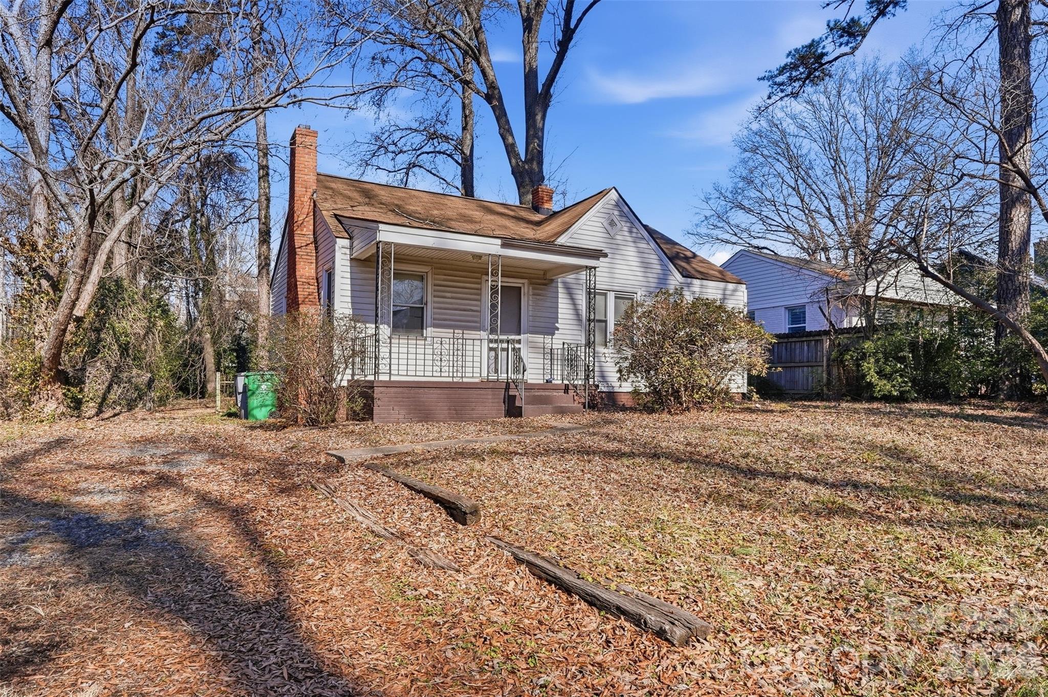 3309 Ritch Avenue Charlotte, NC 28206 - Photo 19 of 25 a front view of a house with a yard and garage
