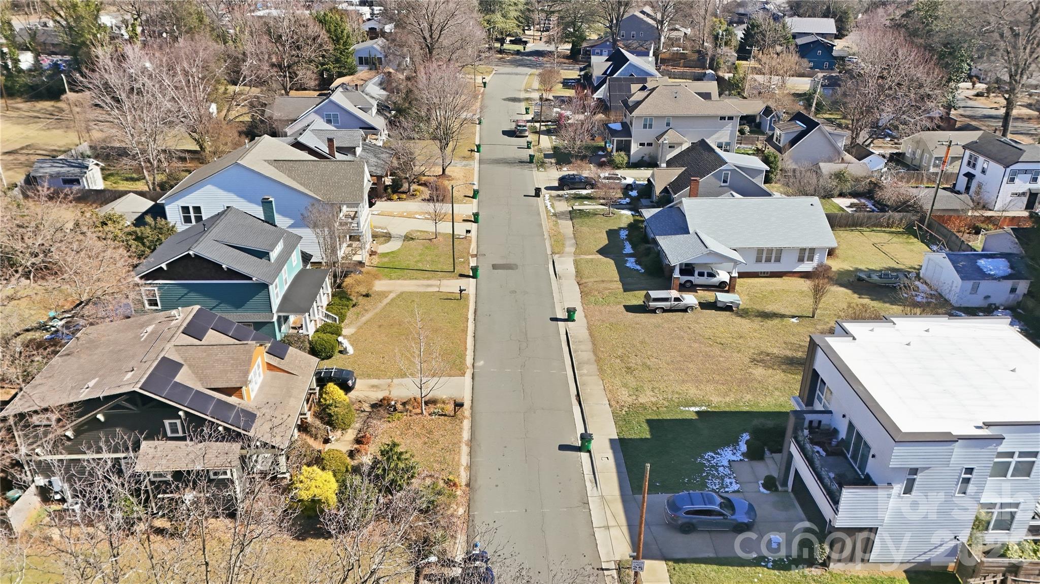 3309 Ritch Avenue Charlotte, NC 28206 - Photo 23 of 25 an aerial view of residential houses with outdoor space and parking