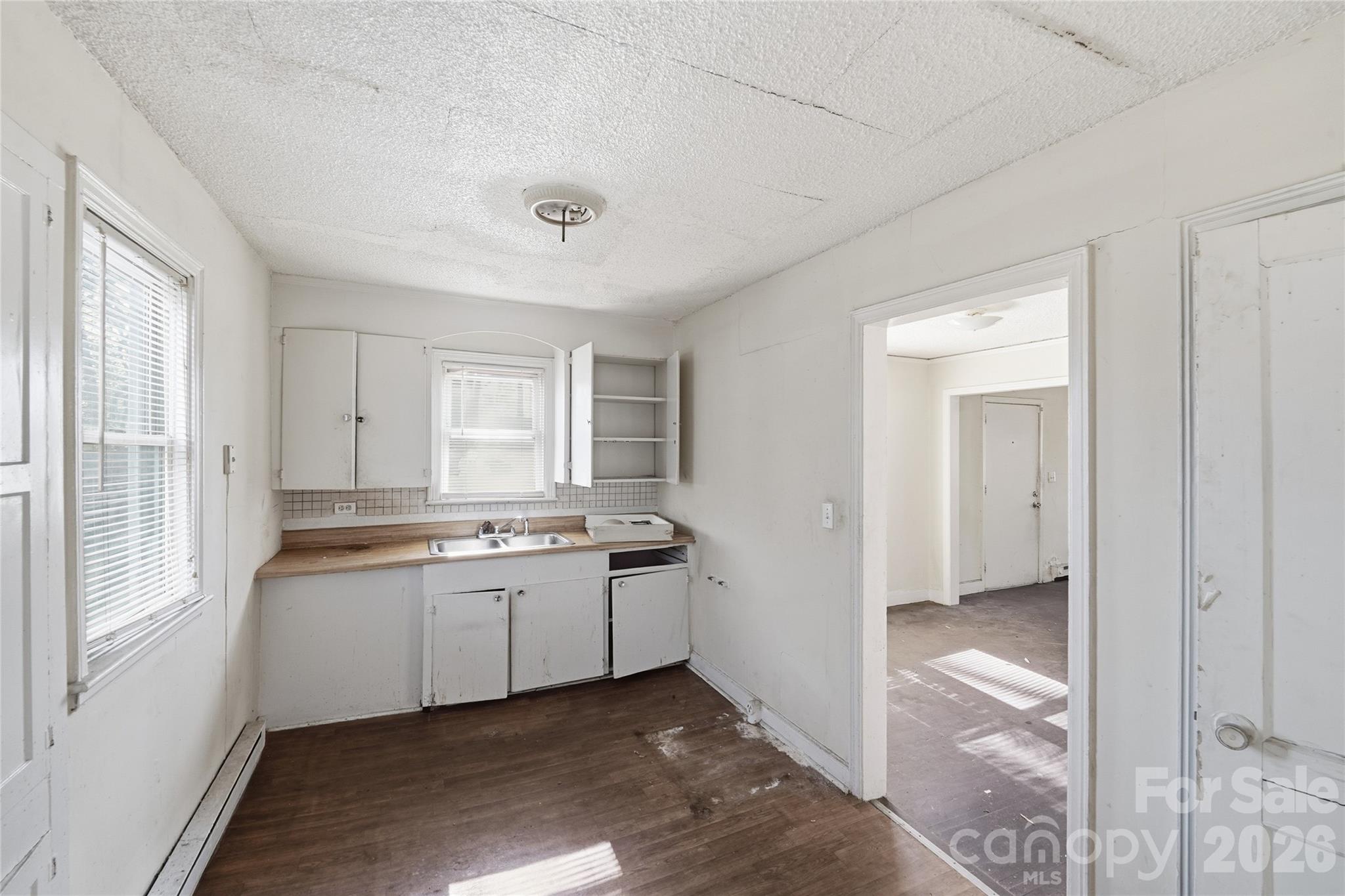 3309 Ritch Avenue Charlotte, NC 28206 - Photo 4 of 25 a view of a kitchen and a sink