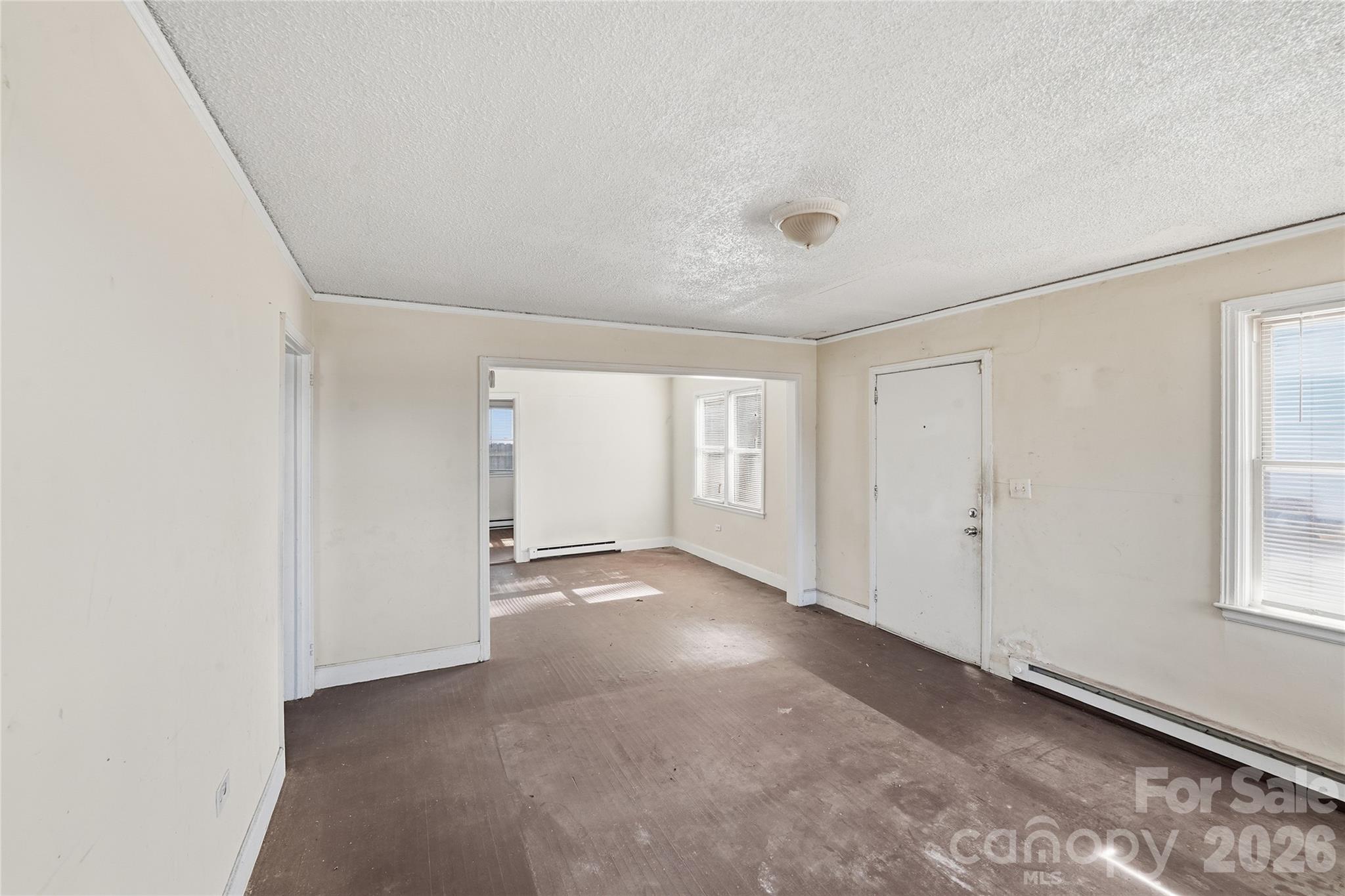 3309 Ritch Avenue Charlotte, NC 28206 - Photo 9 of 25 an empty room with windows
