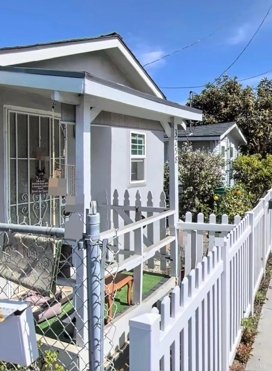 3258 Tyler Street Carlsbad, CA 92008 - Photo 15 of 27 a view of a house with backyard and porch